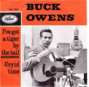 Buck Owens - I've Got A Tiger By The Tail