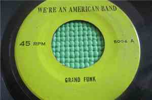 Grand Funk / Paul Simon - We're An American Band / Love Me Like A Rock