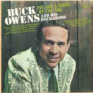 Buck Owens And His Buckaroos - I've Got A Tiger By The Tail