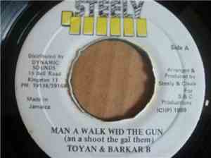 Toyan & Barkar B - Man A Walk Wid The Gun