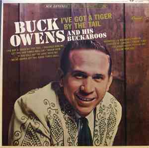 Buck Owens And His Buckaroos - I've Got A Tiger By The Tail