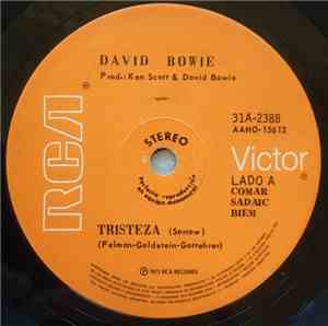 David Bowie - Tristeza = Sorrow / El Hombre Quien Vendido Al Mundo = The Ma ...